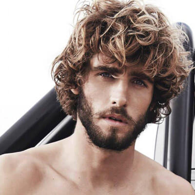 7 Hairstyle Inspirations for Curly Haired Men