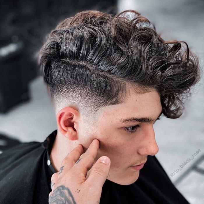 Wavy Brushed Up Hair with Taper Fade