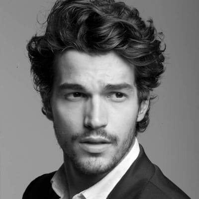 7 Hairstyle Inspirations for Curly Haired Men