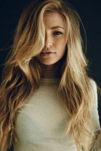long hairstyles with layers side swept sandy blonde