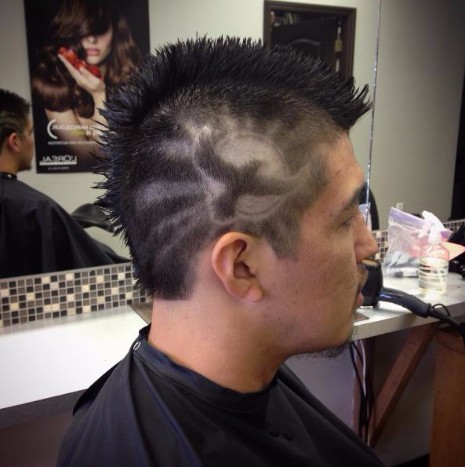 Low Mohawk hairstyle With Artistic Fade
