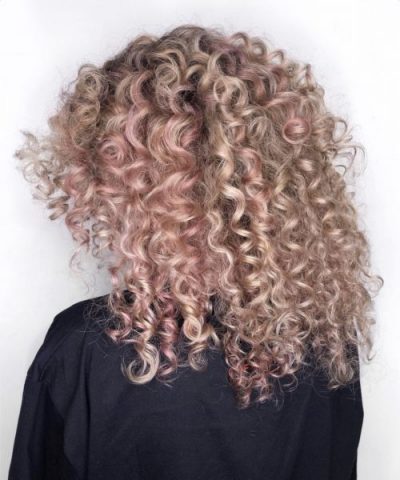 Rose gold hair with spiral curls