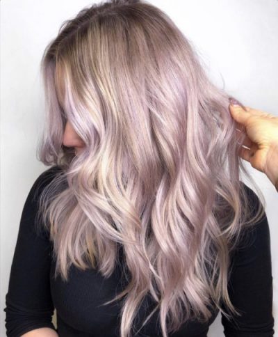 Pastel pink hair with soft curls