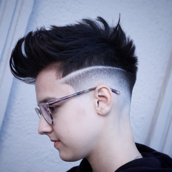 fade haircut with side part