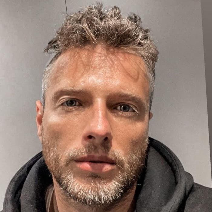 Short Wavy Side Swept Hair + Shaved Sides + Thick Beard