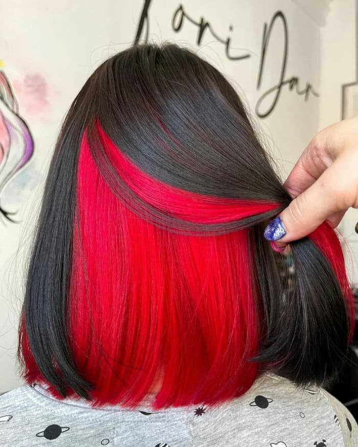 Black Hair with Red Peekaboo Highlights