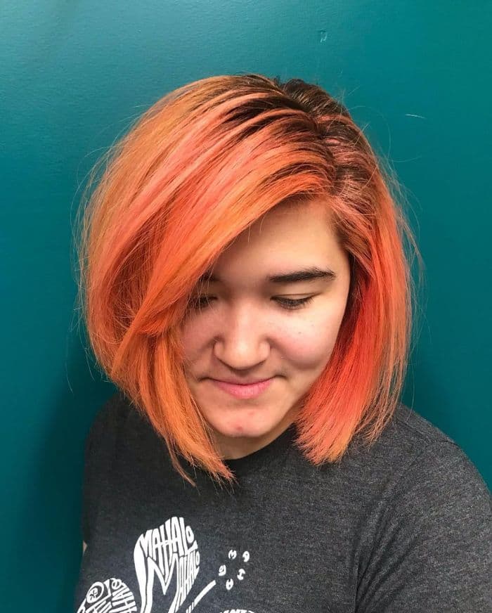Sleek Bob with Peach Hair Color