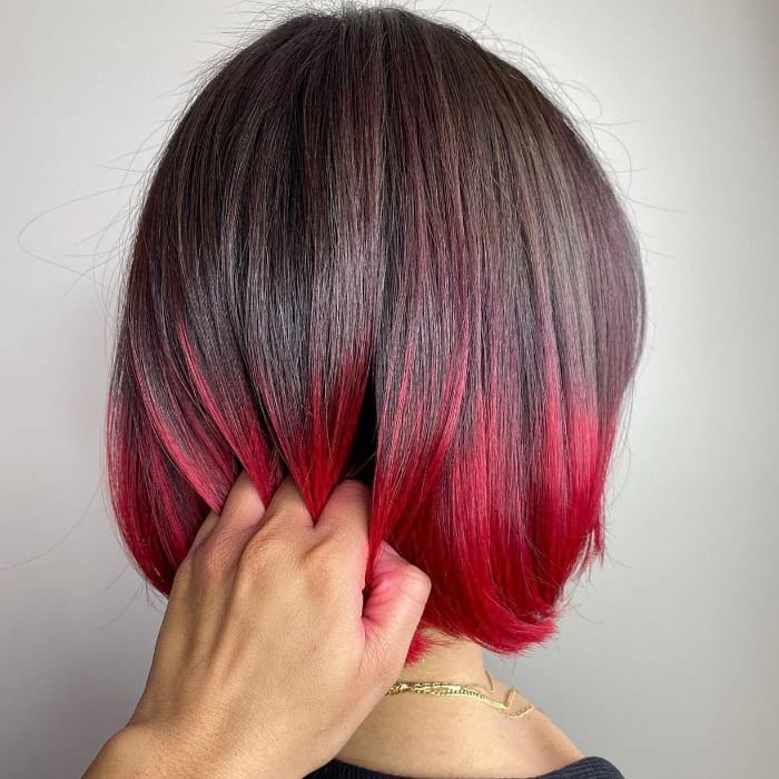 Rounded Asymmetric Bob with Cherry Red Balayage
