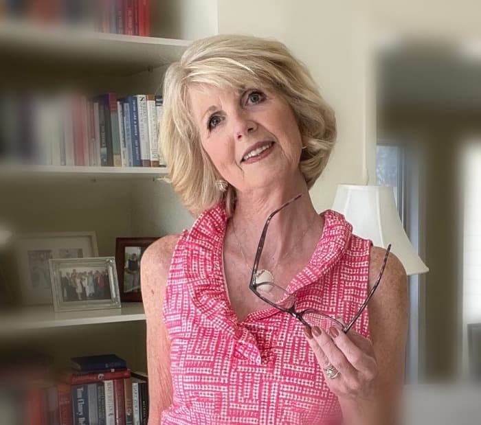 Voluminous Hairstyle with Light Straight Fringe