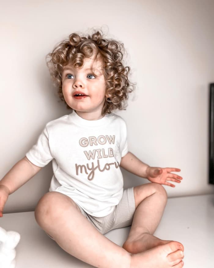 cute toddler boy with curly hair
