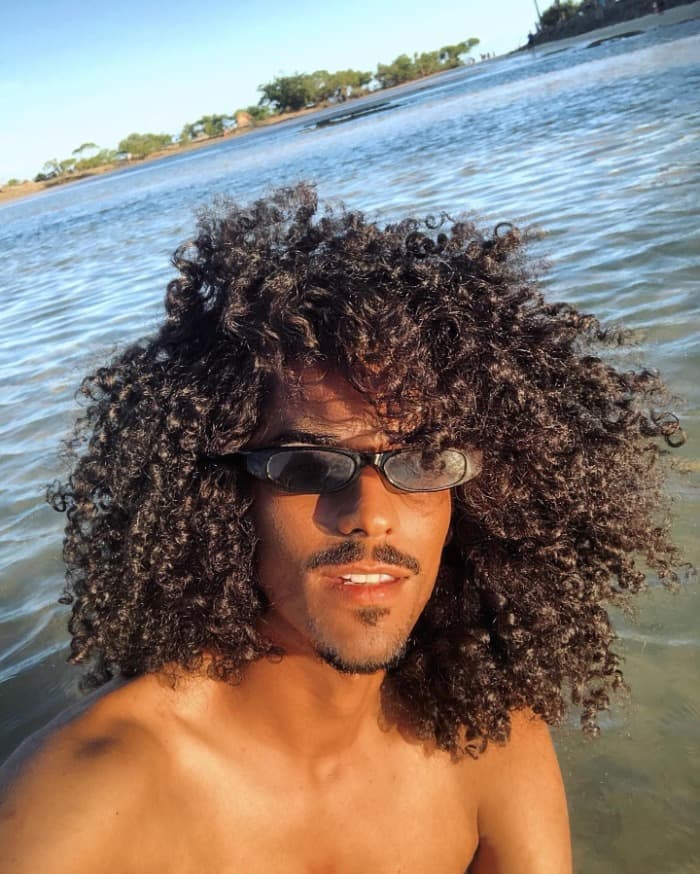 Curly Medium Length With Side Parting